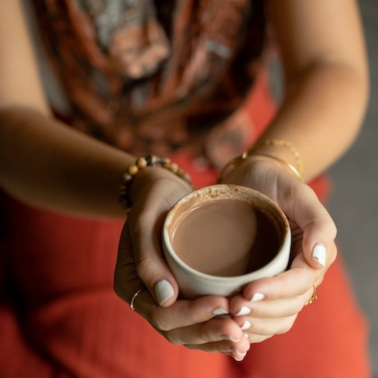 Cacao Wisdom offering sacred ceremonial cacao and cacao mug